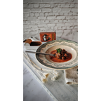 Små pilgrimsmusslor i caldeiradasås