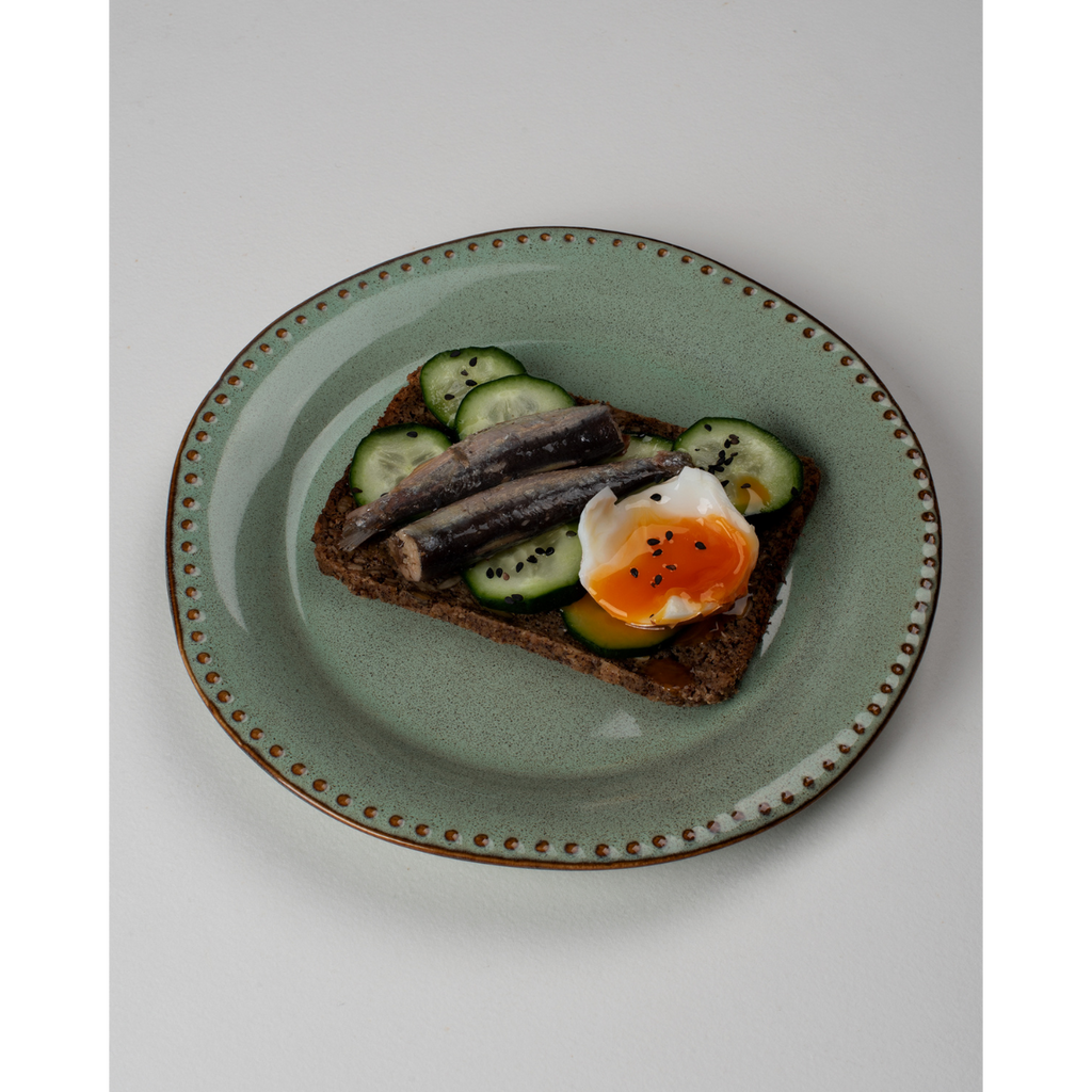 Kryddade små sardiner i extra jungfruolja av ekologisk olivolja